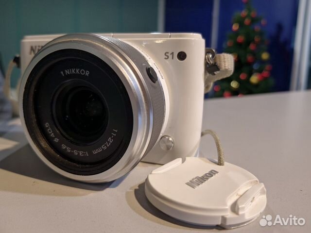Компактный фотоаппарат Nikon 1s1 белый, беззеркаль