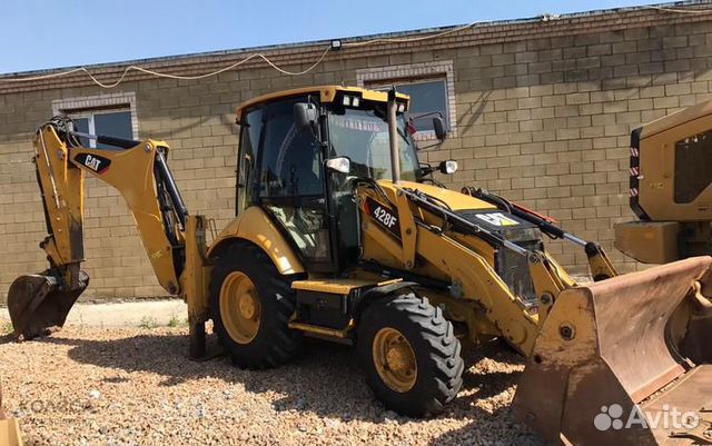 Аренда экскаватора-погрузчика CAT