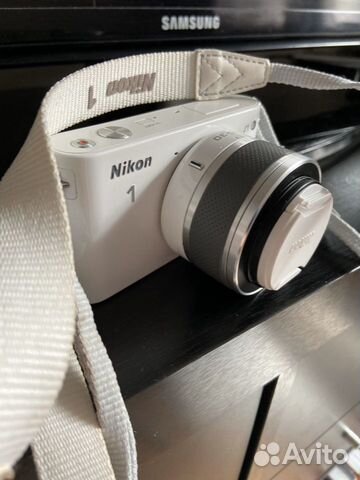 Компактный фотоаппарат Nikon J1 Компактный фотоаппарат Nikon J1