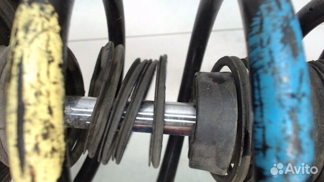 Амортизатор подвески левый передний Nissan Primera