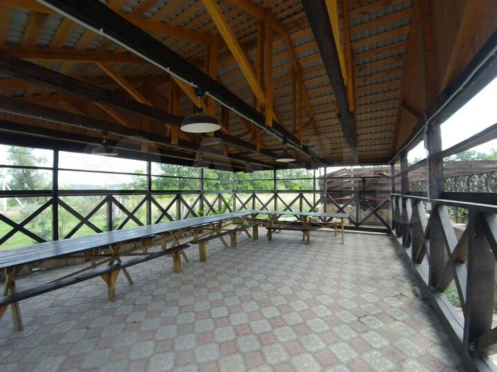 Коттедж 610 м² на участке 18 сот.