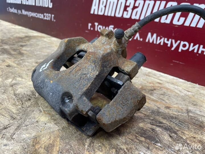 Суппорт тормозной передний левый Renault Sandero