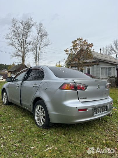 Крышка багажника lancer 10