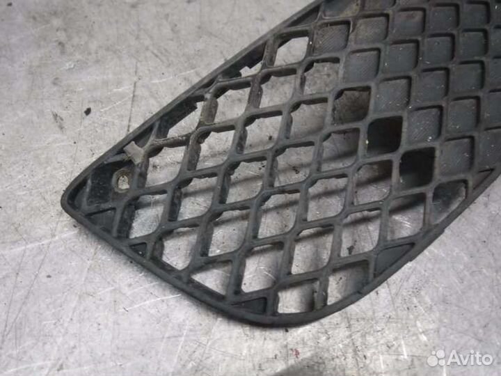Решетка бампера передняя левая Mitsubishi Lancer
