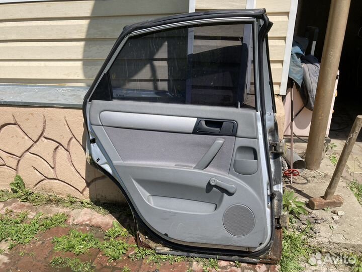 Дверь задняя левая Chevrolet Lacetti седан