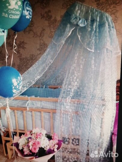 Детская кроватка с маятником