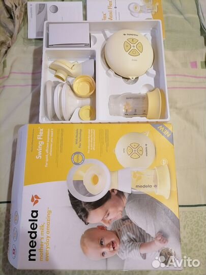Молокоотсос medela swing электрическийй
