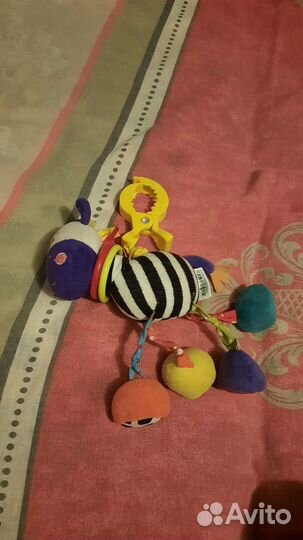 Игрушка на коляску