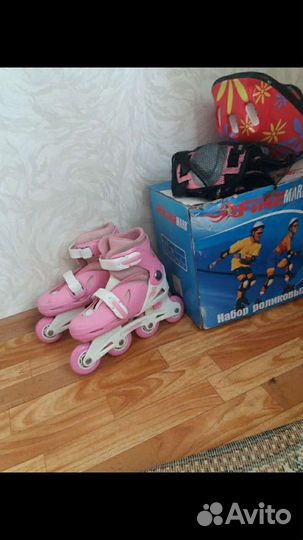 Роликовые коньки