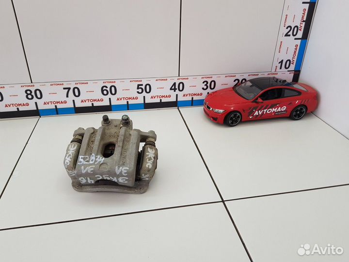 Суппорт задний левый