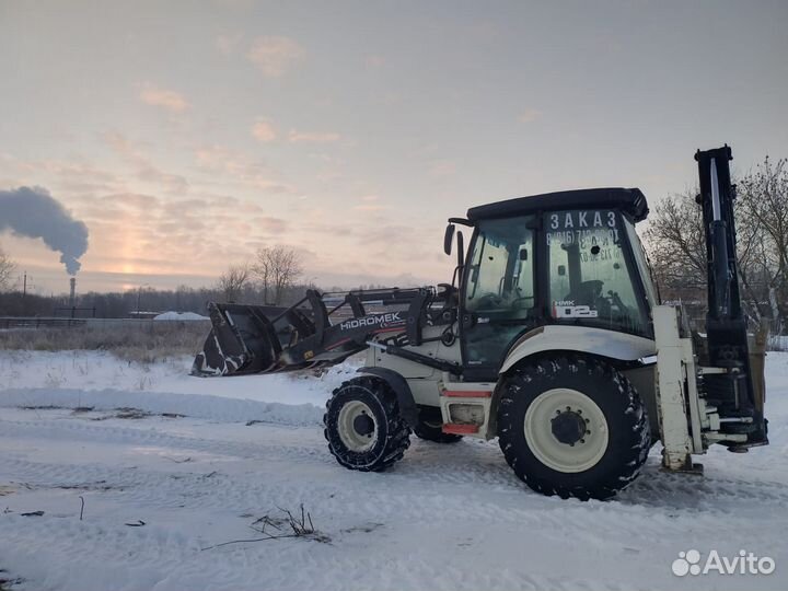 Уборка снега трактором