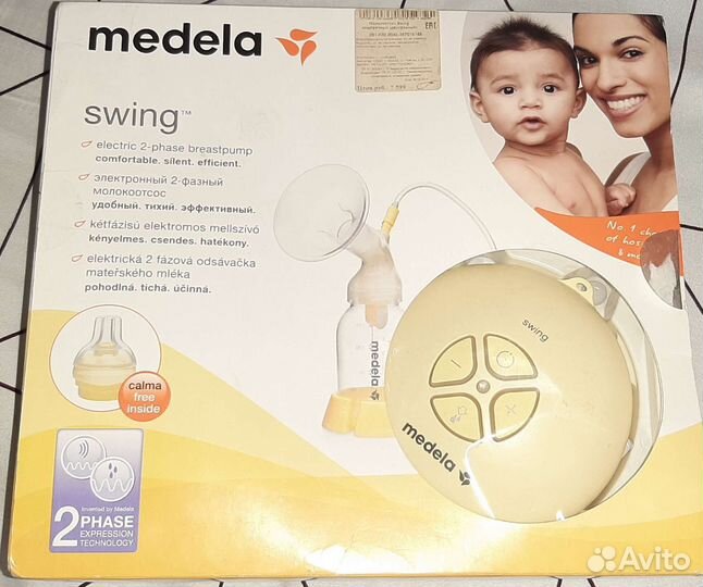 Молокоотсос medela электрический