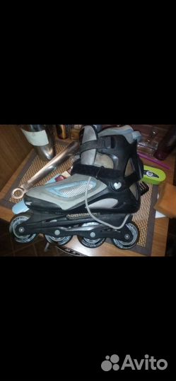 Роликовые коньки