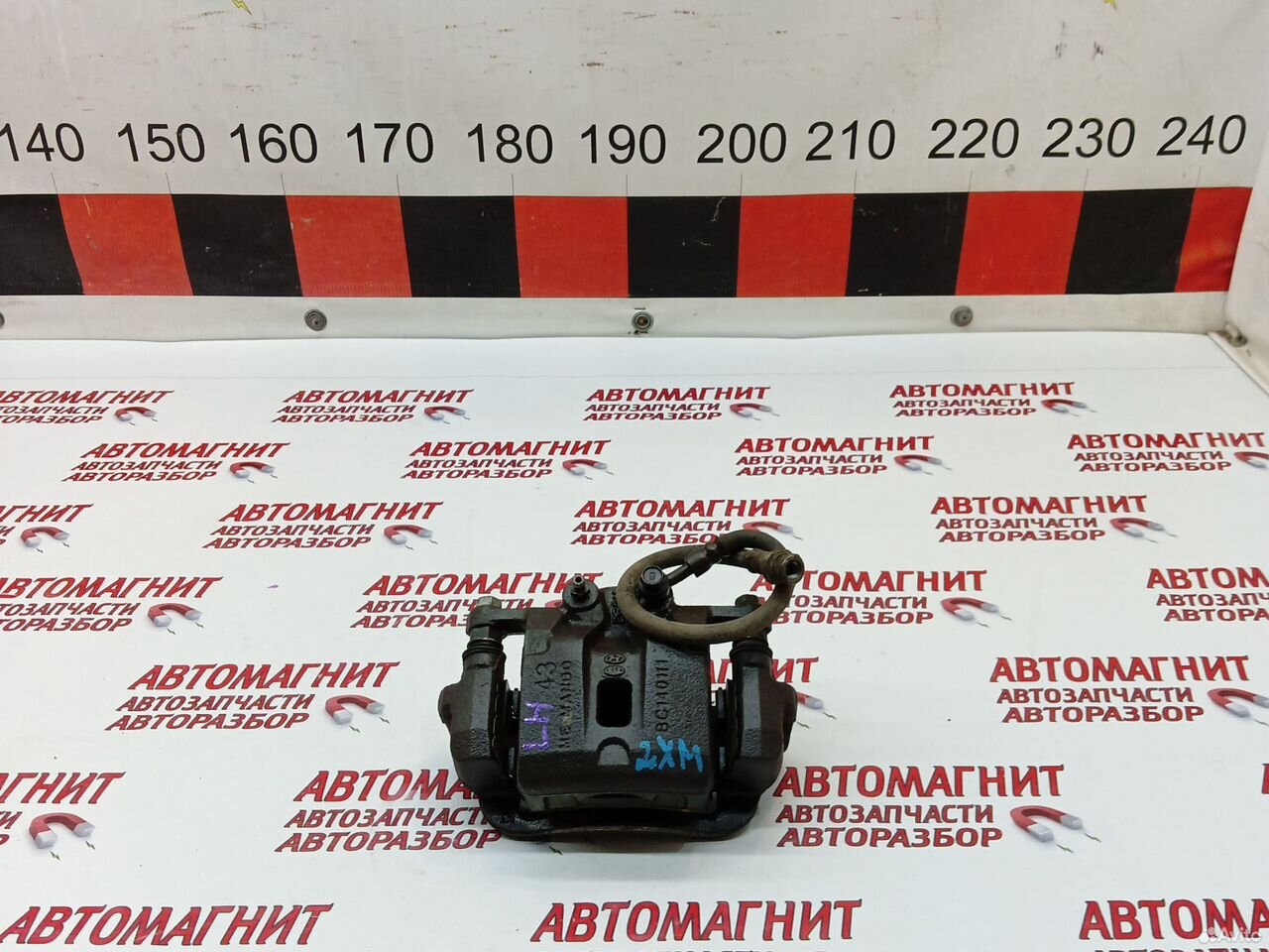 Супорт тормозной задний левый Киа Соренто 2