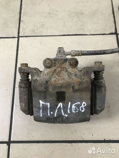 Суппорт тормозной Nissan Teana J32