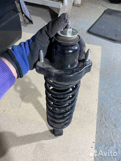 Задняя стойка амортизатора Mitsubishi lancer 10