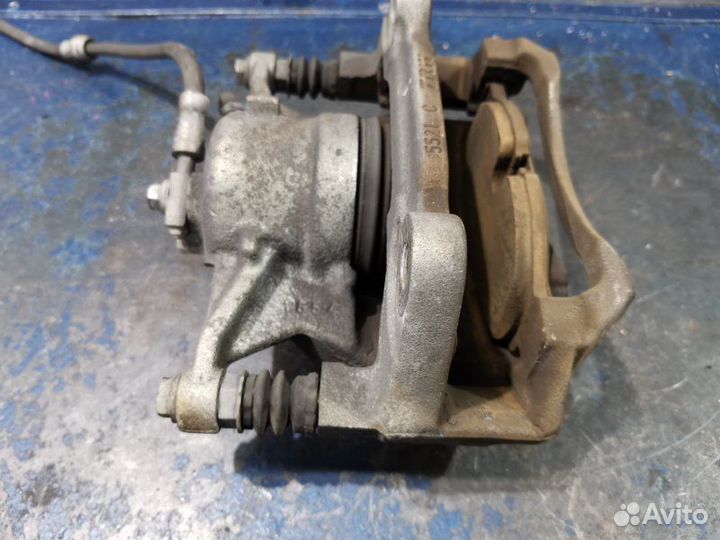 Суппорт передний правый Volkswagen Golf 7