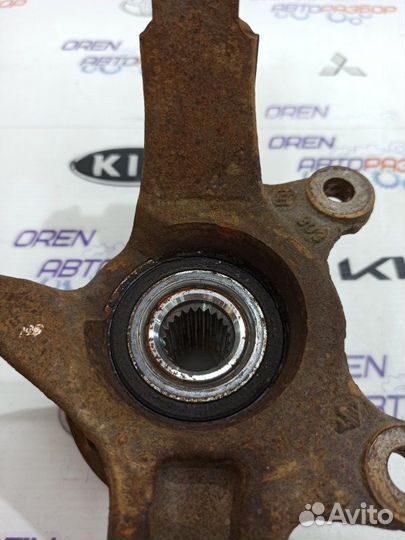 Кулак поворотный передний левый Nissan Note E11