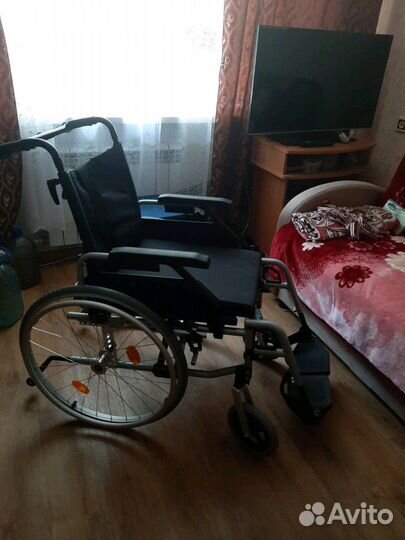 Коляска инвалидная:ортоника