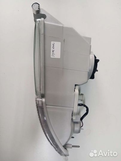 Фара противотуманная левая,с белым указателем пово