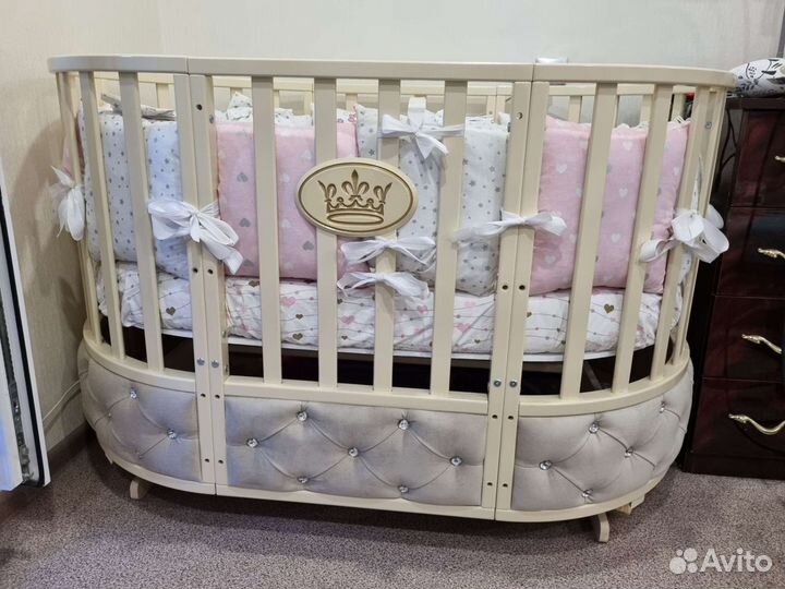 Детская кроватка с маятником овальная