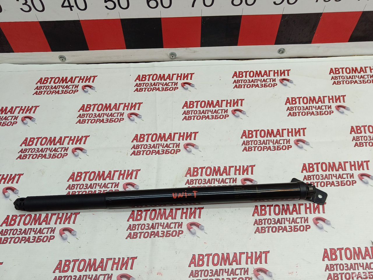 Амортизатор крышки багажника левый Changan UNI-T