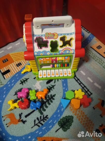 Развивающая игрушка домик с ручкой
