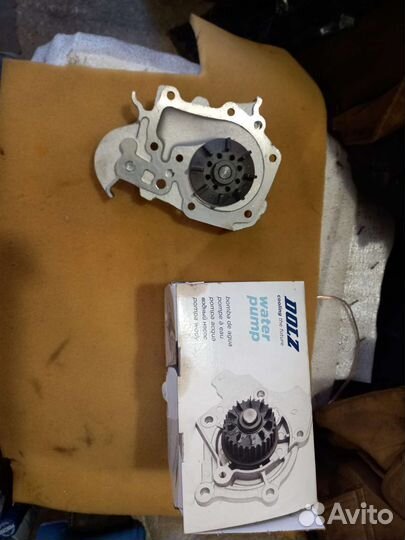 Водяная помпа для автомобиля Рено логан 1