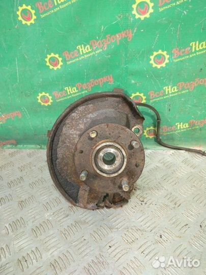 Поворотный кулак передний правый Mitsubishi Lancer