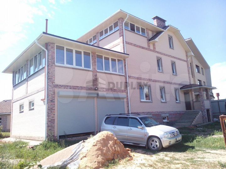 Коттедж 930 м² на участке 20 сот.