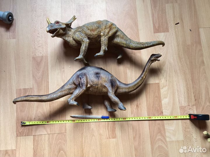 Динозавры игрушки много