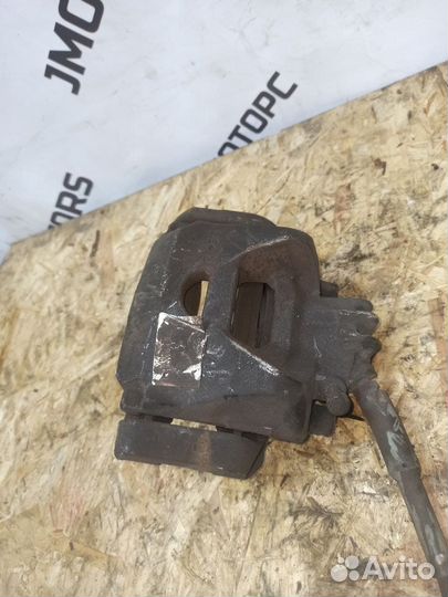 Суппорт тормозной передний левый Peugeot/Citroen