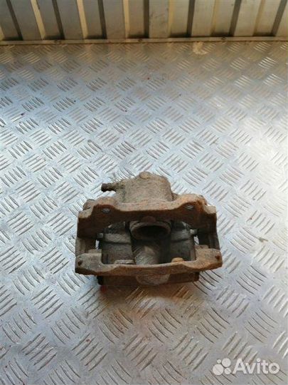 Суппорт тормозной передний левый Fiat Doblo 223