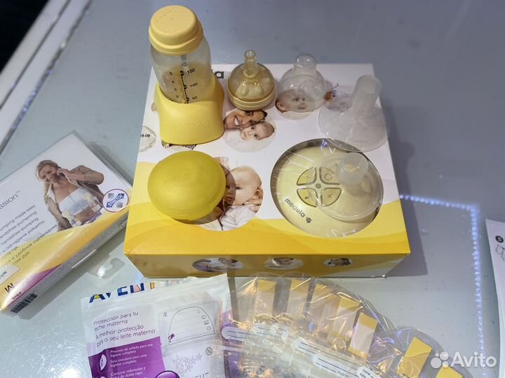 Двухфазный электрический молокоотсос medela