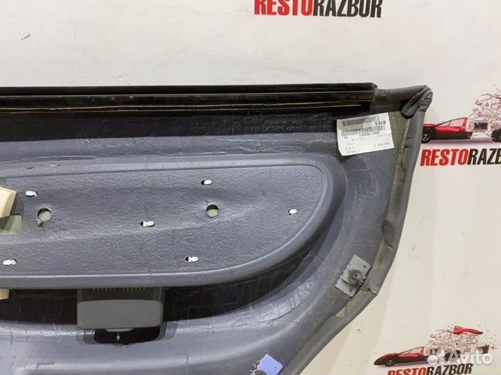 Обшивка боковой двери задняя левая Kia Spectra