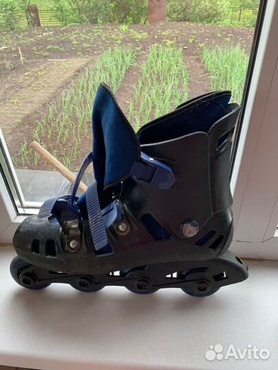 Роликовые коньки