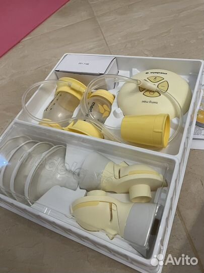 Молокоотсос medela swing maxi flex