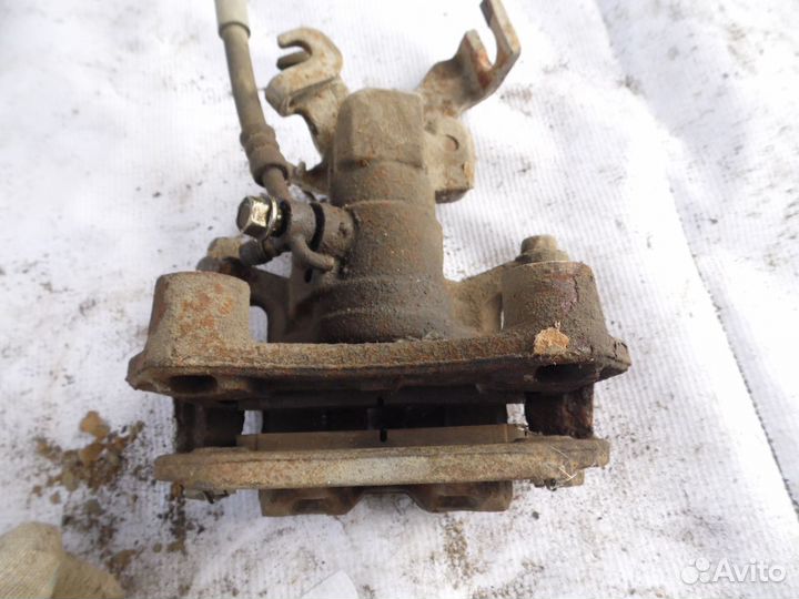 Суппорт тормозной задний левый Mazda Mazda 6 (GH)