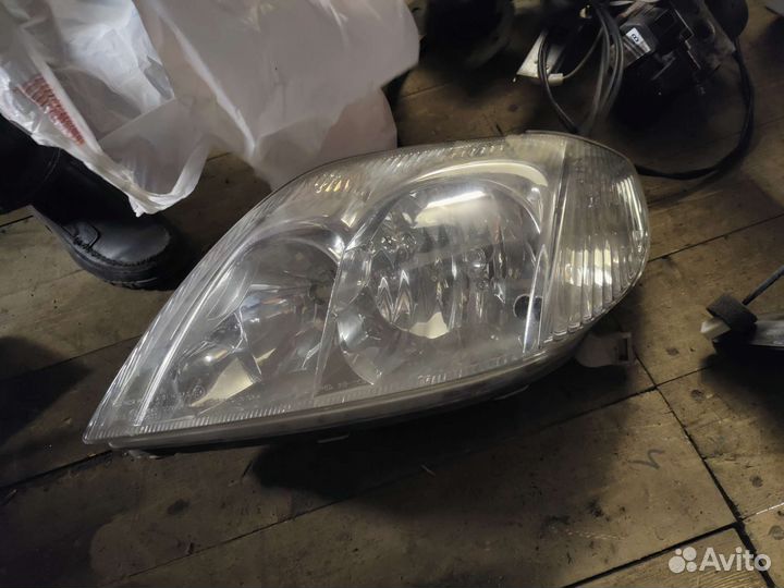 Фара левая Toyota Corolla 120
