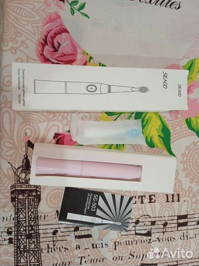 Электрическая зубная щетка