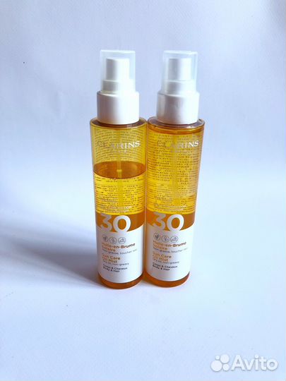 Крем для загара Clarins, Lancaster, Garnier