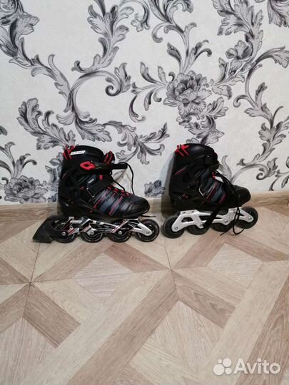 Роликовые коньки