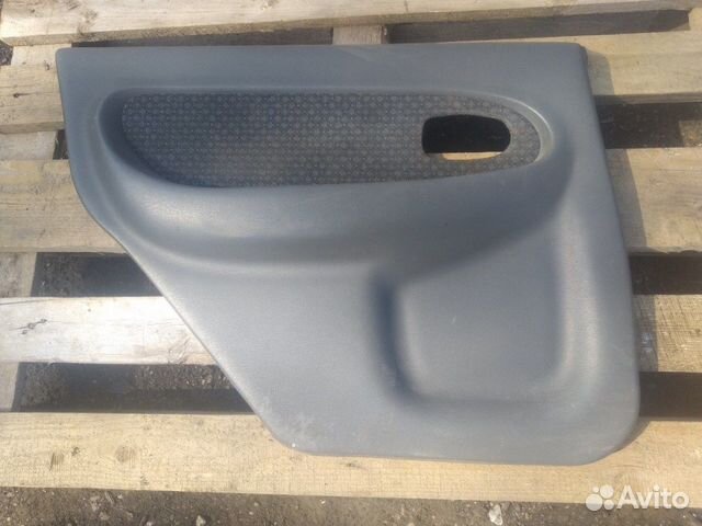Обшивка двери задняя левая Kia Shuma 2 лифтбек 1.6