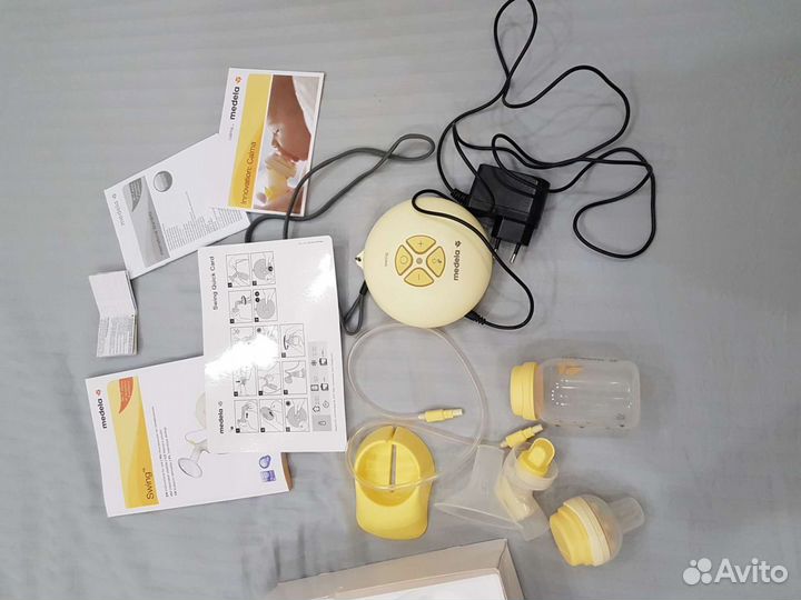 Молокоотсос medela электрический