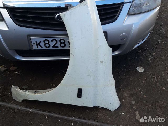 Крыло ниссан марч к 12