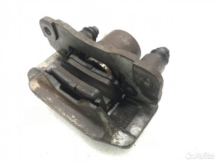 Суппорт задний правый Mitsubishi Pajero Sport KS1W