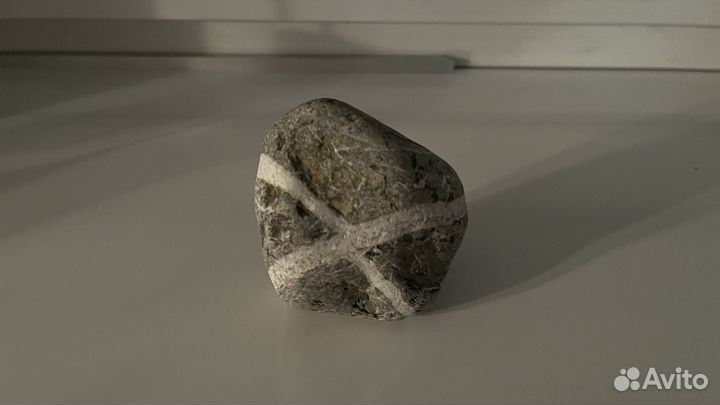 Камень с символом 