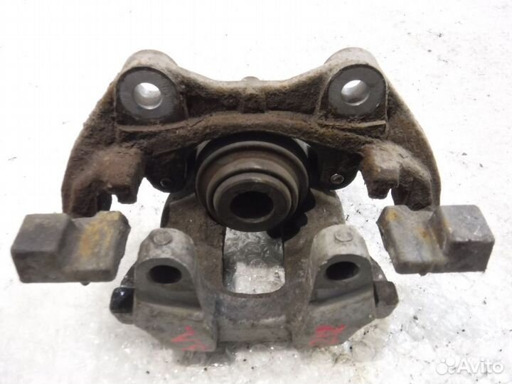 Суппорт задний левый