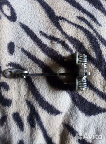 Ограничитель двери Рено Логан