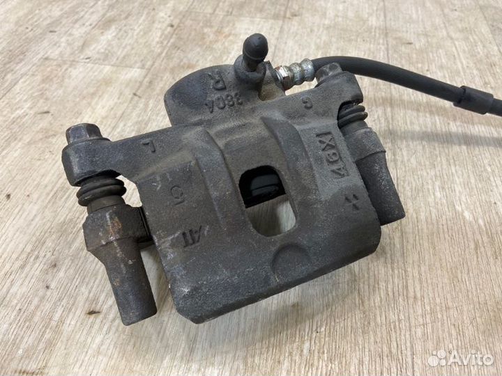 Суппорт задний правый Mitsubishi Lancer 10 CY3A